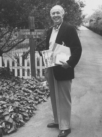 Actor Walter Brennan Standing in Front of His Home with Mail