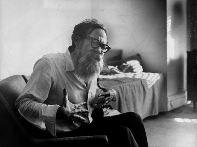 American Poet John Berryman Expressing Himself While Sitting in His Semi Empty Apartment