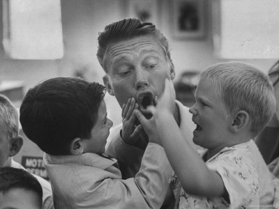 Chuck Connors, TV Star of The Rifleman, Playing with Son Kevin and Mark Levy